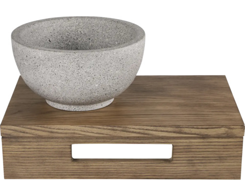 Skål i konststen på träbricka