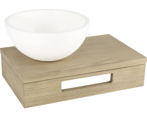 Vit skål på trälåda