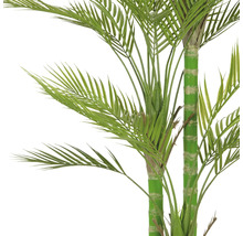 Konstgjord palm med gröna blad som dekoration för inomhusbruk