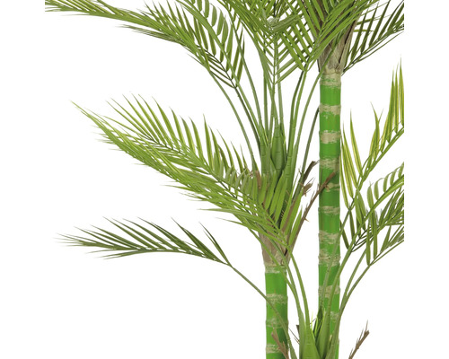 Konstgjord palm med gröna blad som dekoration för inomhusbruk