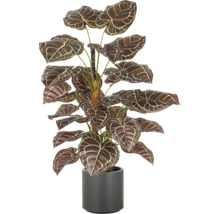 Konstgjord krukväxt i kruka med mönstrade blad.