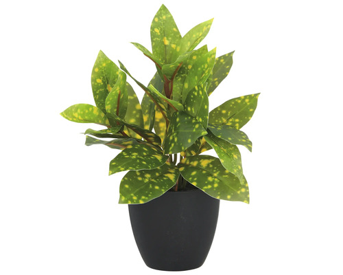 Konstgjord växt i svart kruka