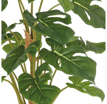 Konstgjord Monstera-växt med stora, gröna blad