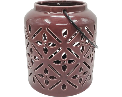 Dekorativ keramisk lykta med mönster och handtag