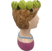 Blomkruka kvinnohuvud i profil