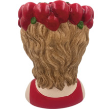 Keramisk figur med äppeldekoration, bakifrån