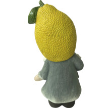 Dekorativ trädgårdstomte med citronhuvud