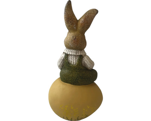 Dekorativ kanin på ett ägg som påskdekoration
