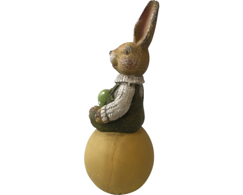 Påskharedekoration som sitter på en boll