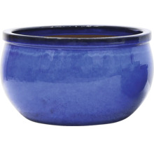 Blå keramisk blomkruka