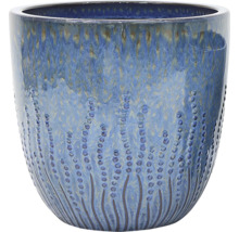 Blå keramisk blomkruka med prickigt mönster