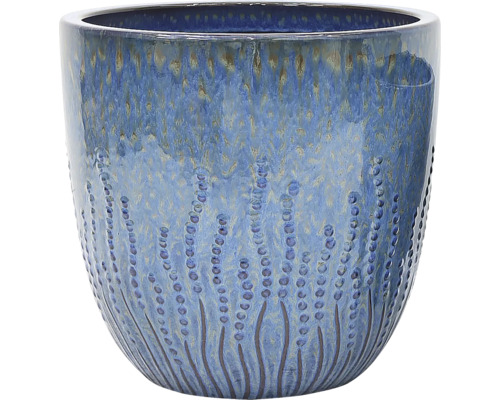 Blå keramisk blomkruka med prickigt mönster
