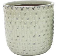 Keramisk blomkruka med fjällmönster