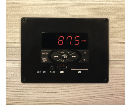 Svart ljudmodul med digital display och kontroller.