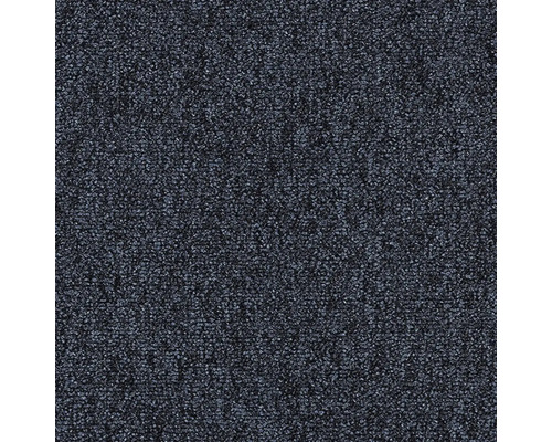 Närbild av en mörk mönstrad matta