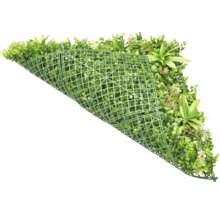 Konstgjord växtmatta med olika gröna växter