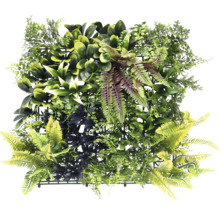 Konstgjord växtvägg med olika gröna växter