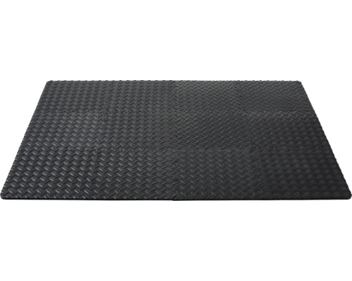 Svart pusselmatta med räfflad plåtmönster