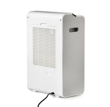 Vit luftavfuktare med ventilationsgaller på baksidan