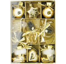 Diverse guldfärgade julgransdekorationer i en förpackning