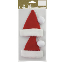 Två röda tomtemössor med vit kant och tofs som julgransdekoration