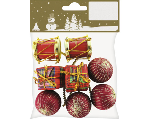 Förpackning med julgransdekorationer bestående av trummor, presenter och bollar