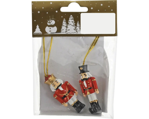 Två nötknäpparhängen i förpackning för juldekoration