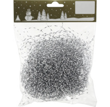 Silverglitter i en förpackning