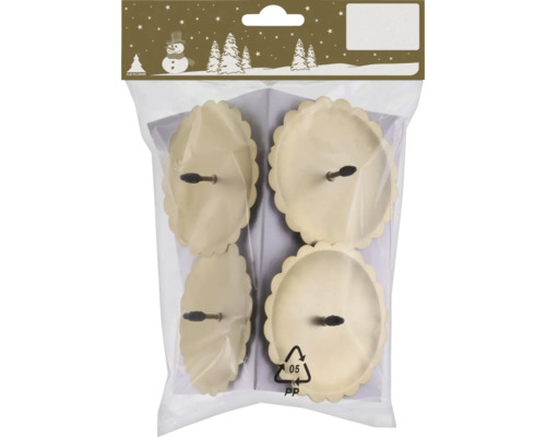 Fyra ljusstakar i metall i en förpackning