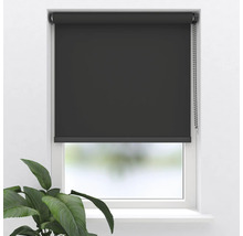 Svart rullgardin framför ett fönster