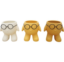 Tre blomkrukor med glasögondesign