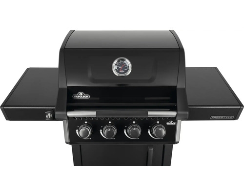 Svart Napoleon Freestyle gasolgrill med fyra brännare och termometer