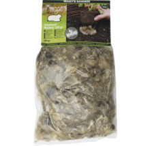 Fårullsflingor i en 100 grams förpackning för trädgården