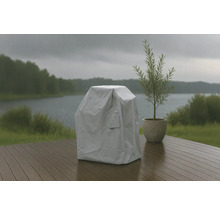 Grill med väderskydd på en terrass i regnet