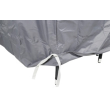 Detalj av ett grått skyddshölje med fästband