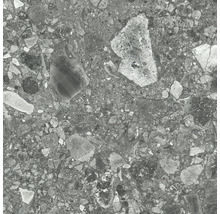 Närbild av en golvplatta med stendekor