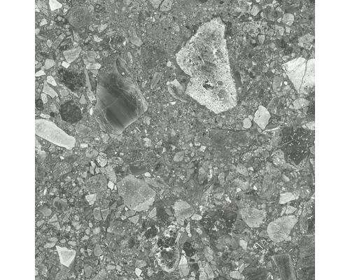 Närbild av en golvplatta med stendekor