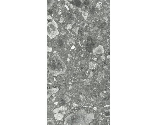 Närbild av en grå keramisk platta med sten dekor