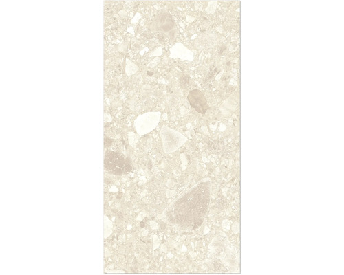 Närbild av en golvplatta i terrazzo-look