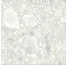 Detaljbild av en golvplatta med stendekor