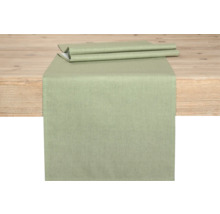 Bordslöpare av tyg på ett träbord