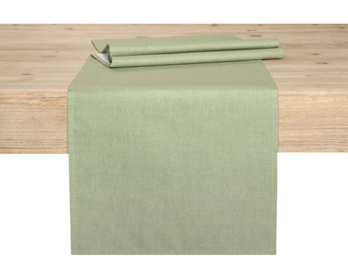 Bordslöpare av tyg på ett träbord