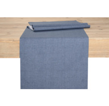 Bordslöpare av tyg på ett träbord