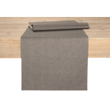 Bordslöpare av tyg på ett träbord