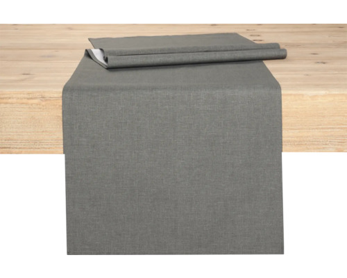 Grå bordslöpare på träbord