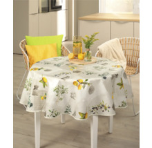 Dukat runt bord med citronmönster i ett ljust kök