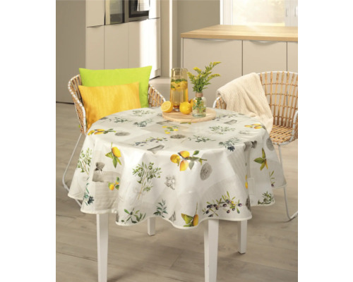 Dukat runt bord med citronmönster i ett ljust kök