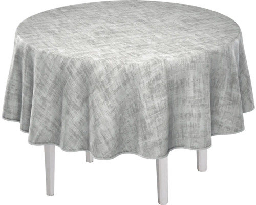 Runt bord med mönstrad duk