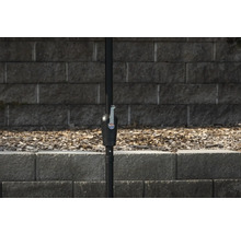 Detaljvy av en parasollstång med vevmekanism