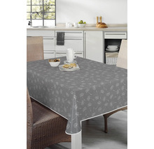 Grå duk med maskrosmönster på ett matbord i köket